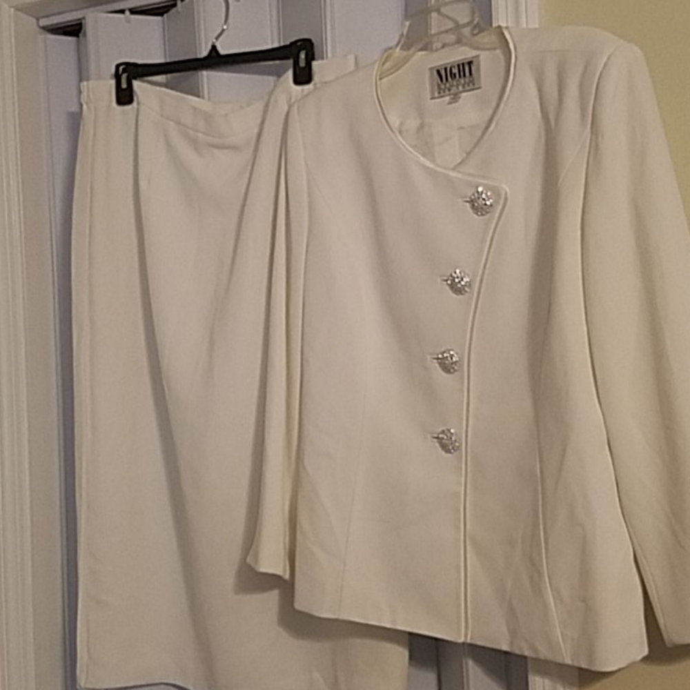 Suit with rhinestone buttons